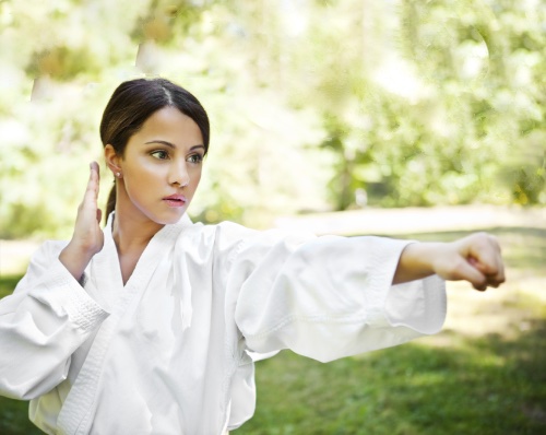 woman punching karate